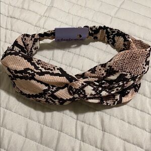 NWT Claire’s headband sneak print